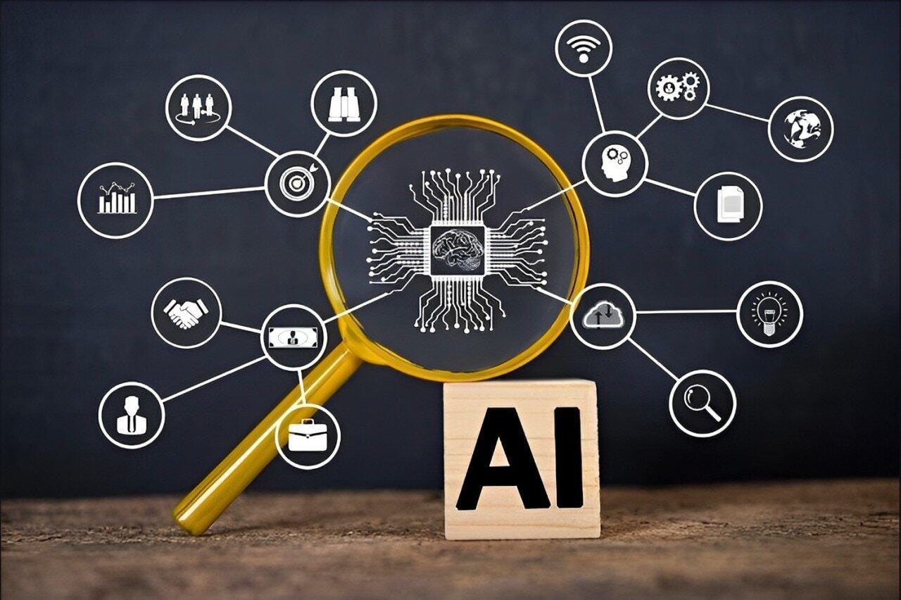 Marketing manager using an AI writing assistant and a design tool side by side on a desktop